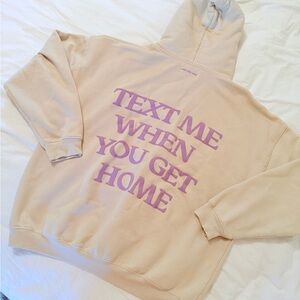 Lonely Ghost Cream Hoodie with Lavender Text